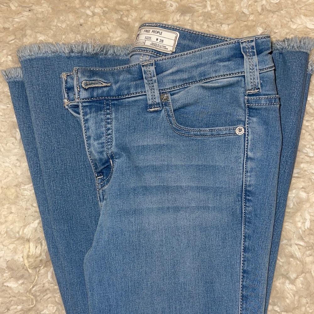 Free People “Denim Super Flare Jeans” in the color “Pretty Blue”
